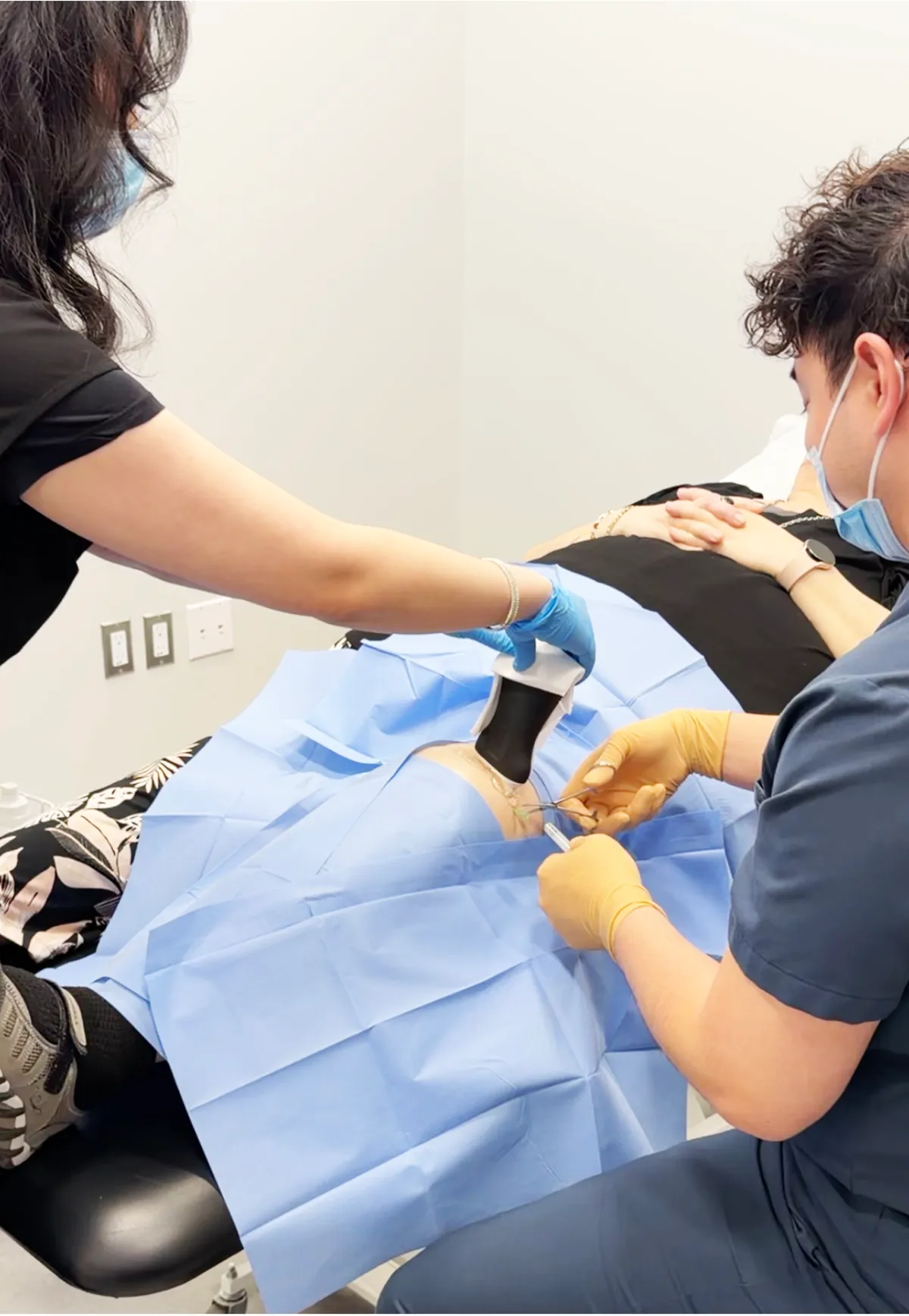 The ultrasound-guided injection being performed at the clinic